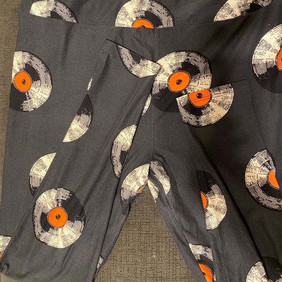 LuLaRoe Black and Orange Leggings with Record Print - Picture 1 of 3